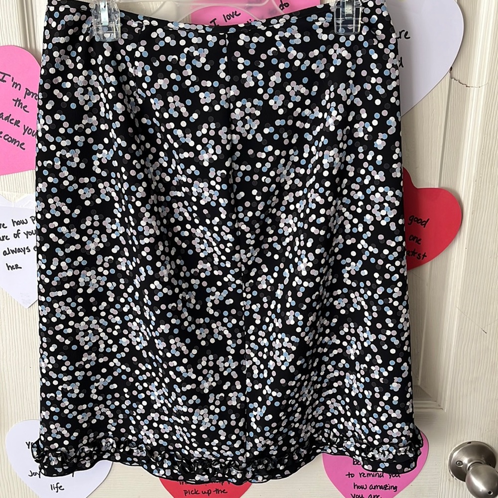 Black skirt with confetti dot print. Size 10